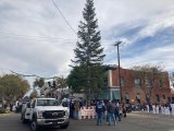 The Lemoore Volunteer Fire Department raises the Christmas tree.